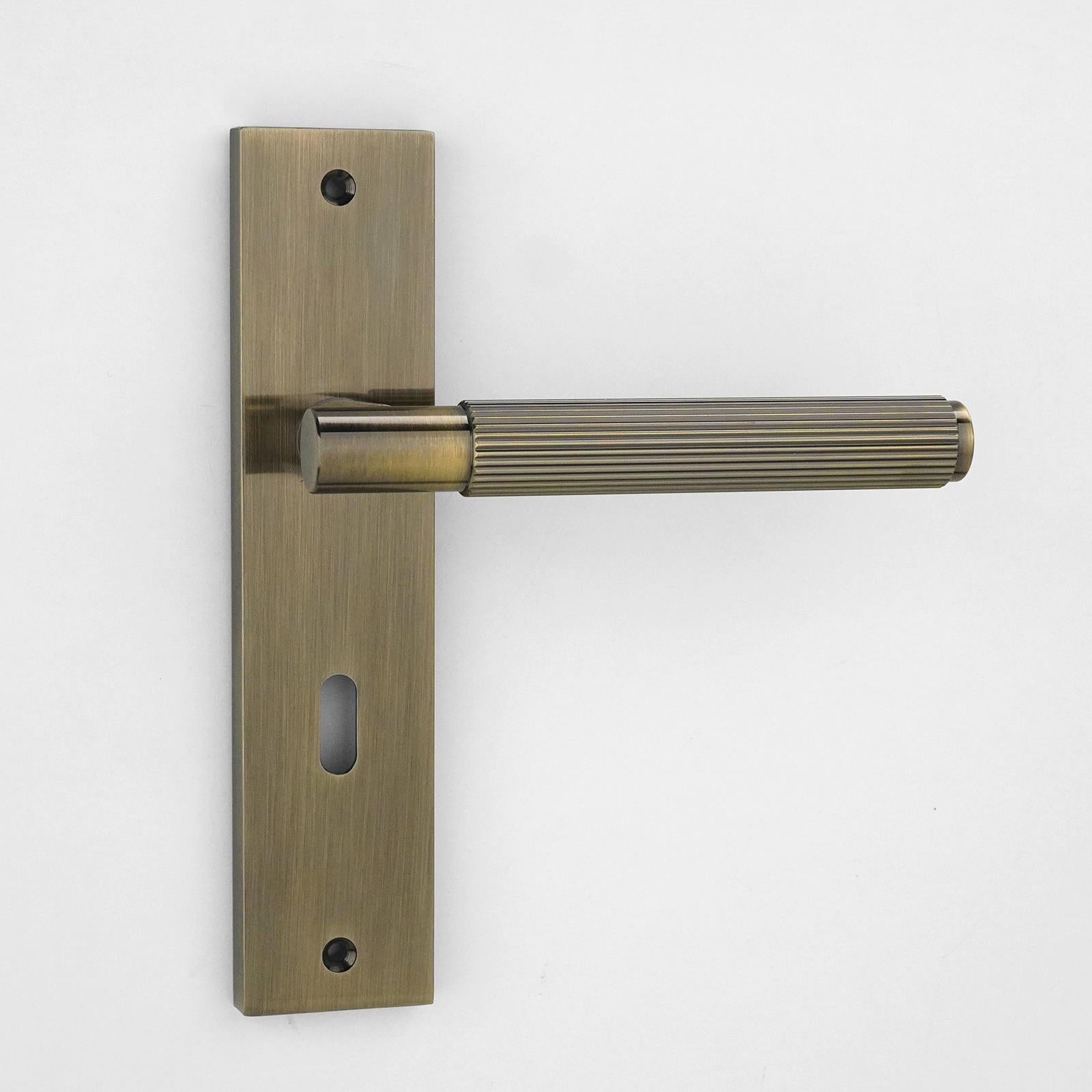 Hera Door Handle on Backplate - Key Hole - Antique Brass