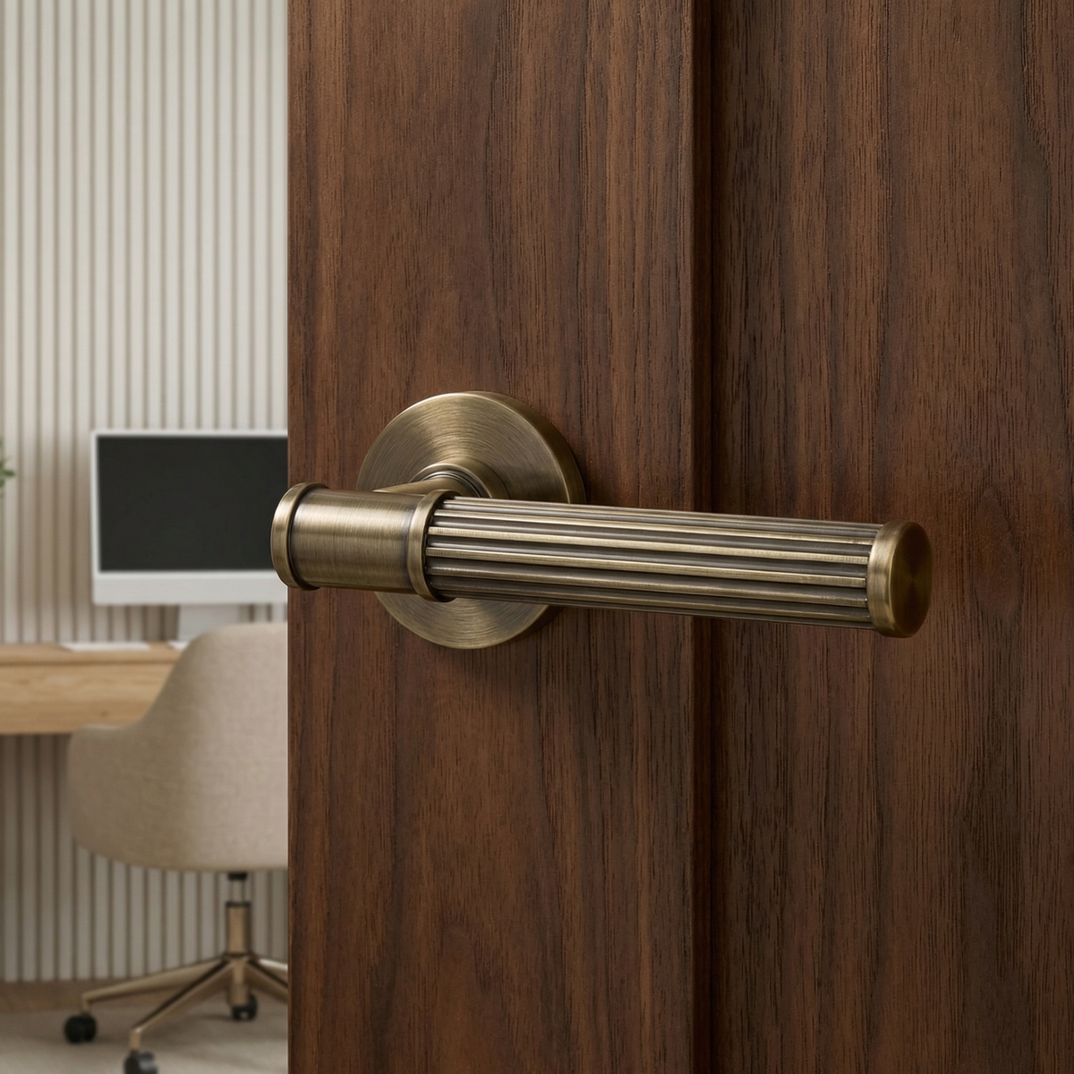 Leto Antique Brass Door Lever Handles – fitted on an interior door in a styled room setting