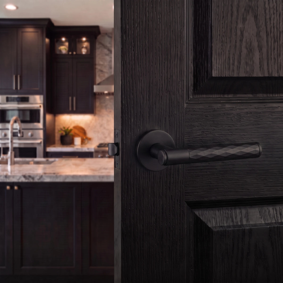 Tore Matt Black Passage Door Handles – fitted on an interior door in a styled room setting 5