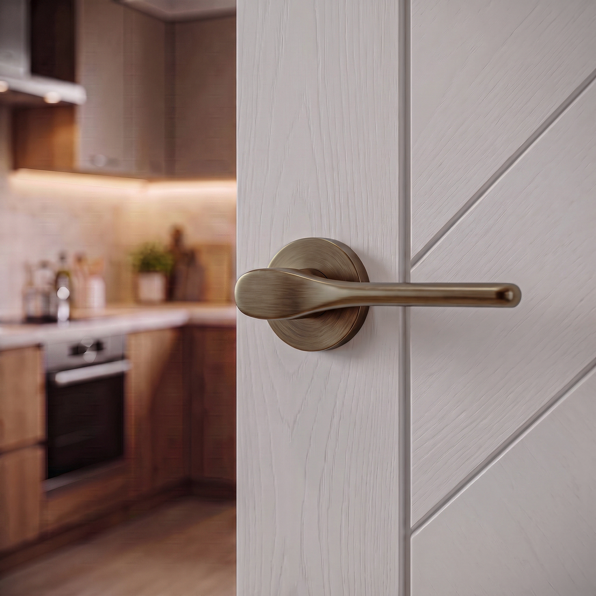 Verita Antique Brass Passage Door Lever Handles – fitted on an interior door in a styled room setting 4