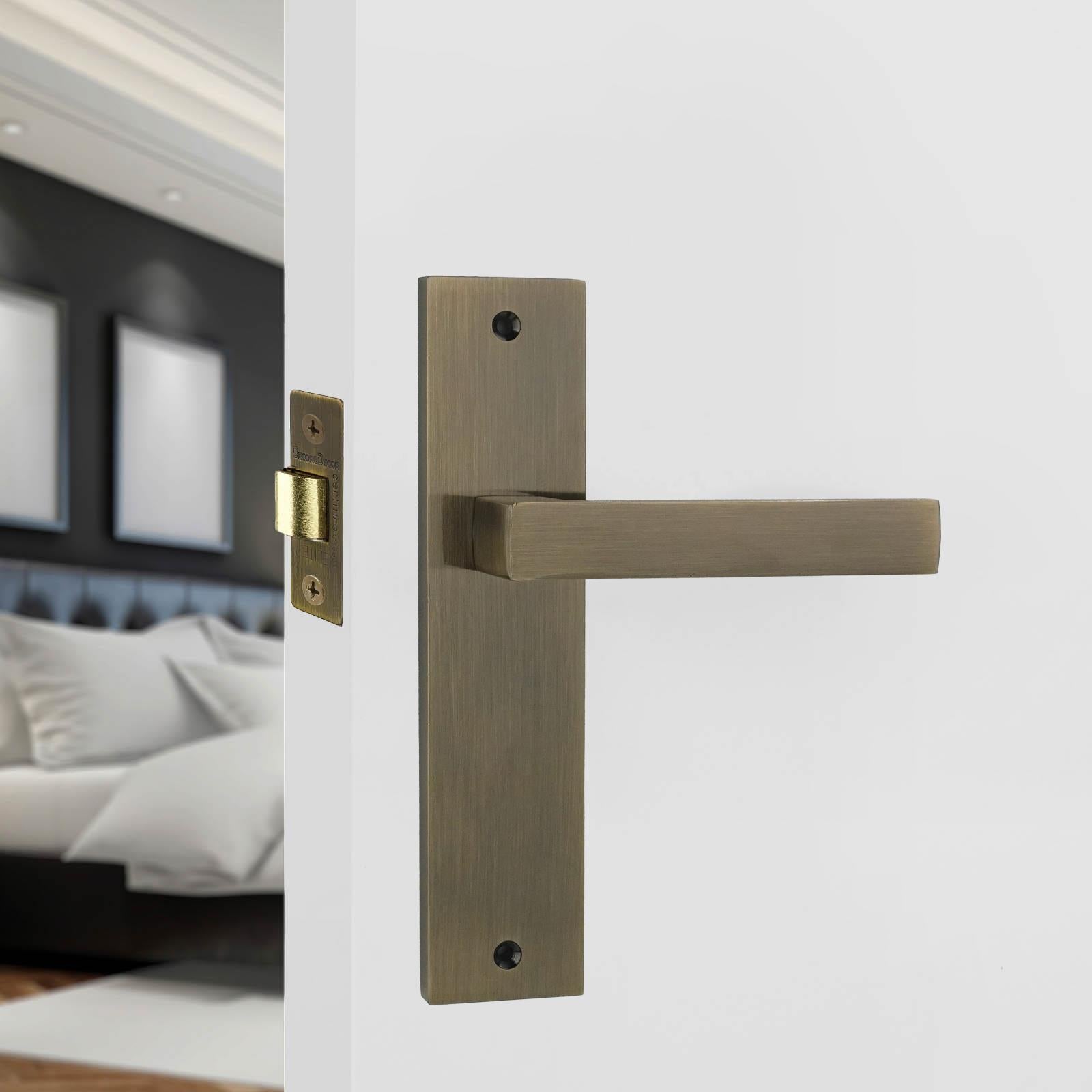 Lumina Antique Brass Passage Door Handles on Backplate - Latch Kit Set