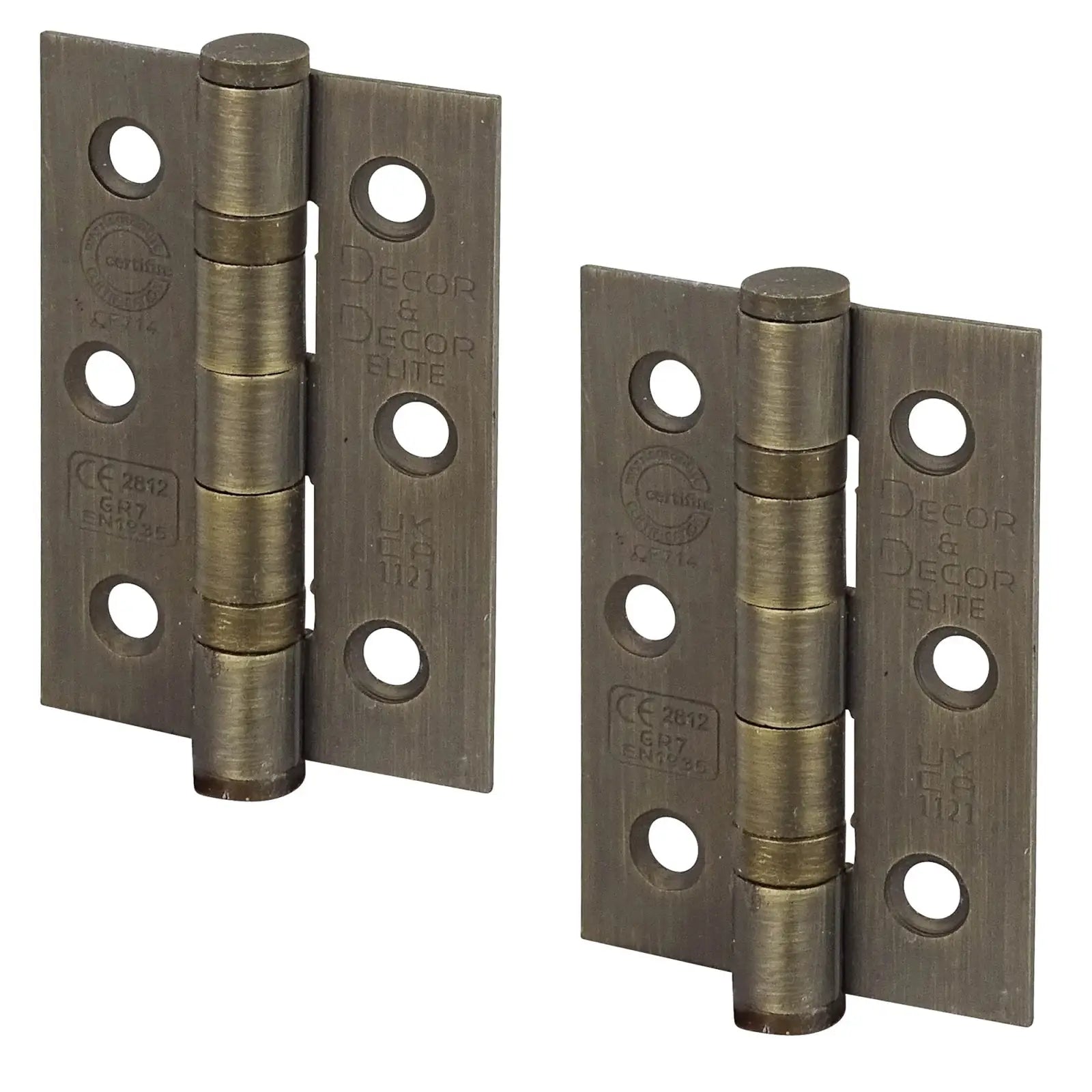 Two antique brass ball bearing fire rated door hinges 76mm pair close-up view