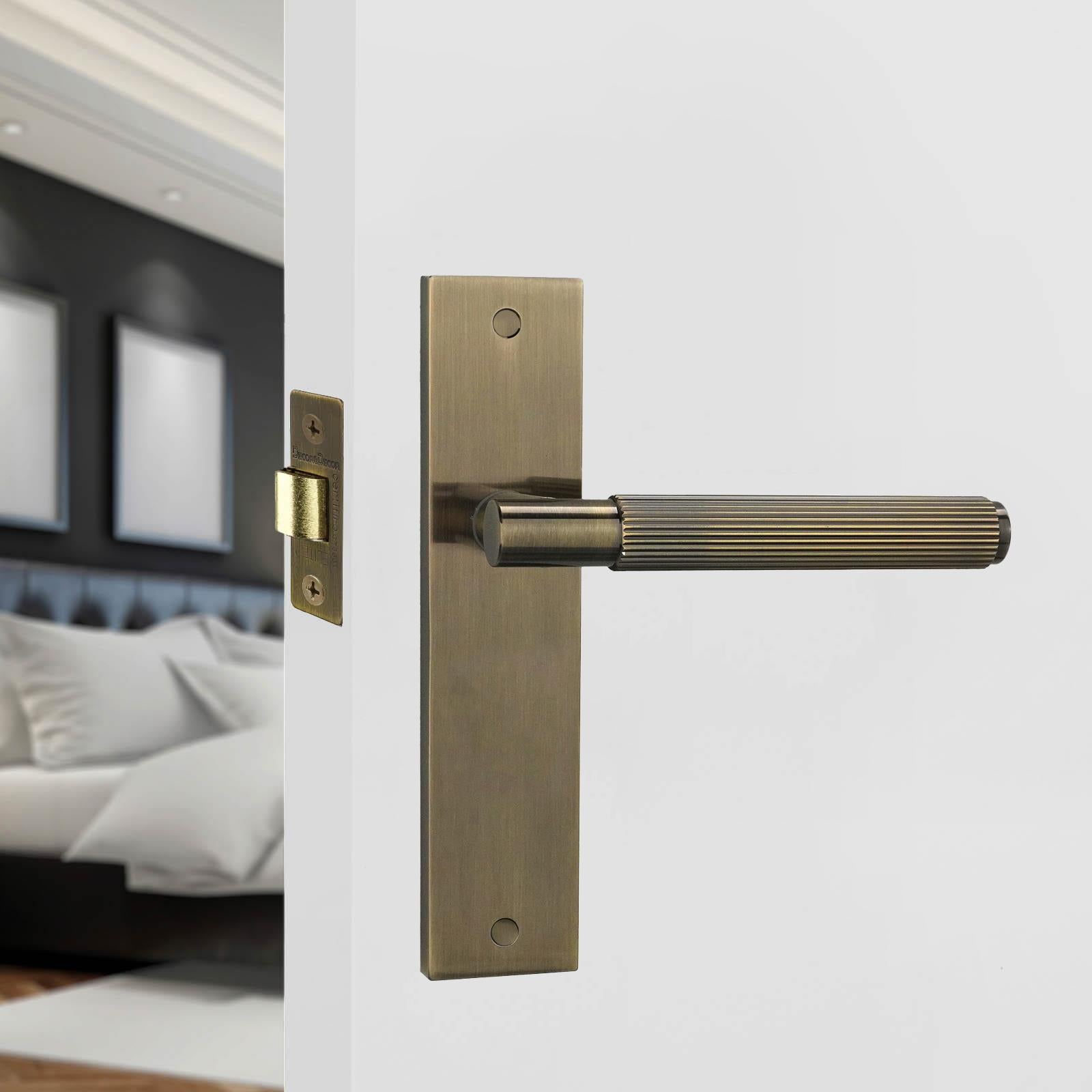 Hera Antique Brass Passage Door Handles on Backplate - Latch and Hinge Set