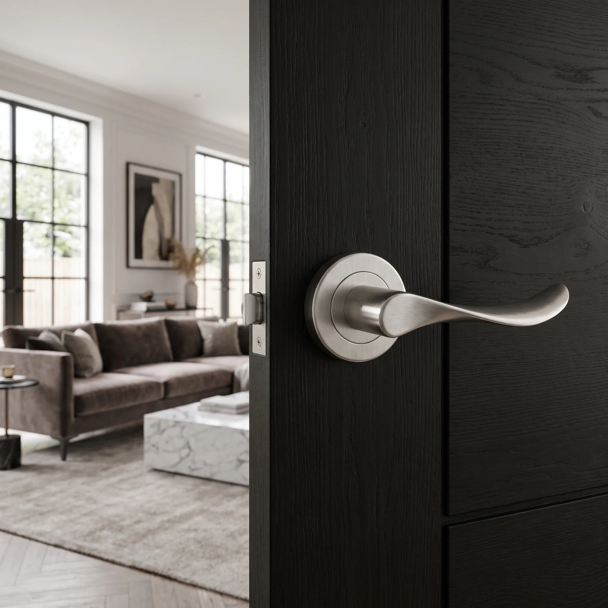 Nimbus Satin Nickel Door Lever Handles – fitted on an interior door in a styled room setting 2