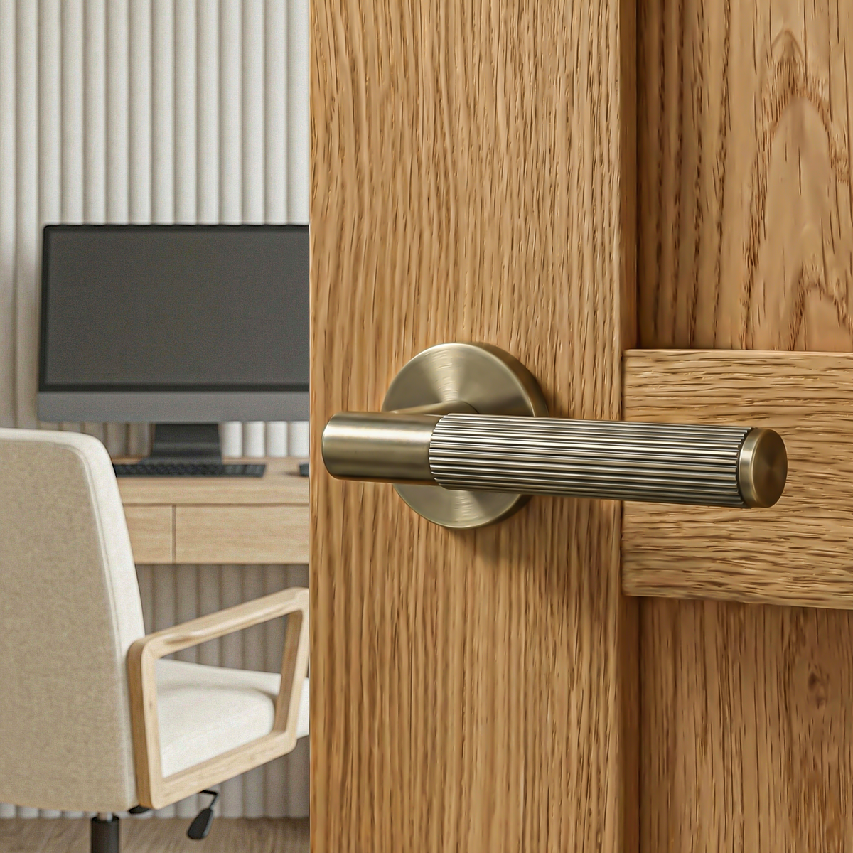 Hera Antique Brass Door Lever Handles – fitted on an interior door in a styled room setting 2