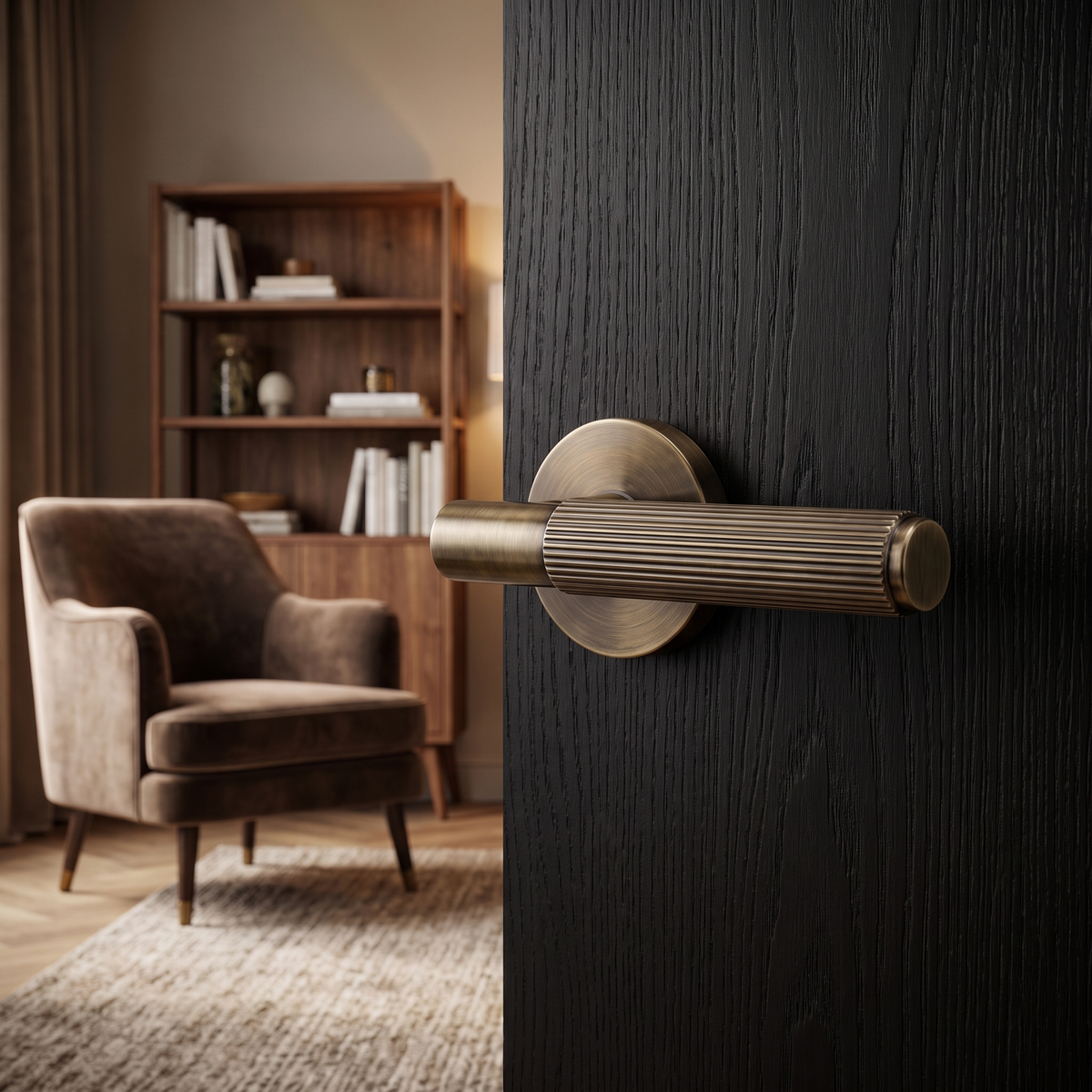 Hera Antique Brass Door Lever Handles – fitted on an interior door in a styled room setting 2