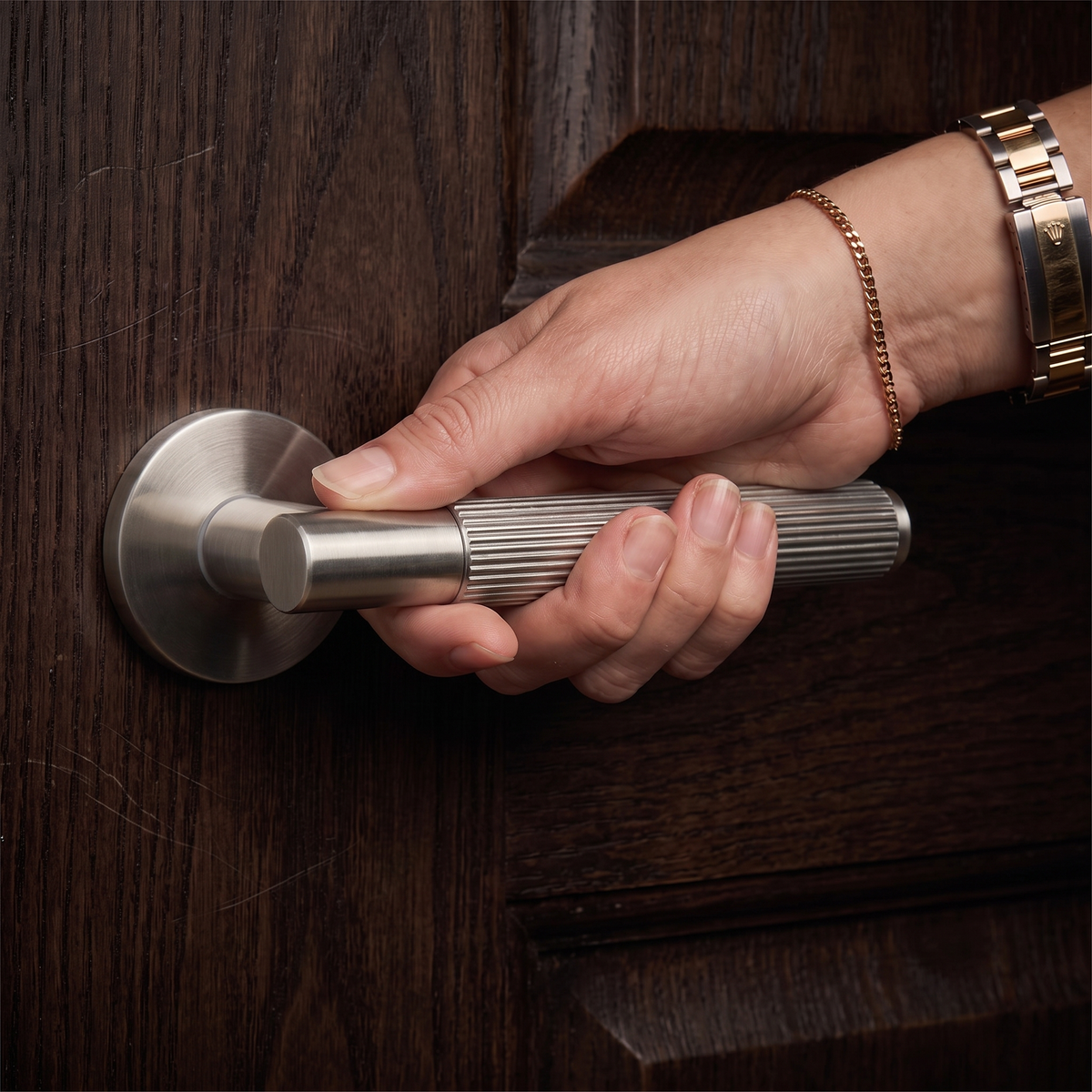 Hera Satin Nickel Passage Door Lever Handles – held in hand to show the size and finish