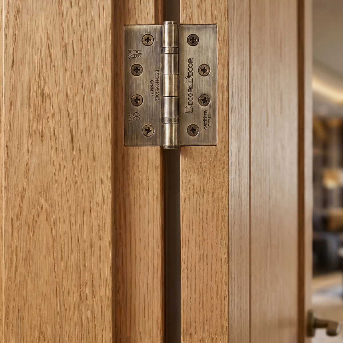 Ball Bearing Fire Rated Door Hinges - 102mm - Pair - Antique Brass – in a styled room setting