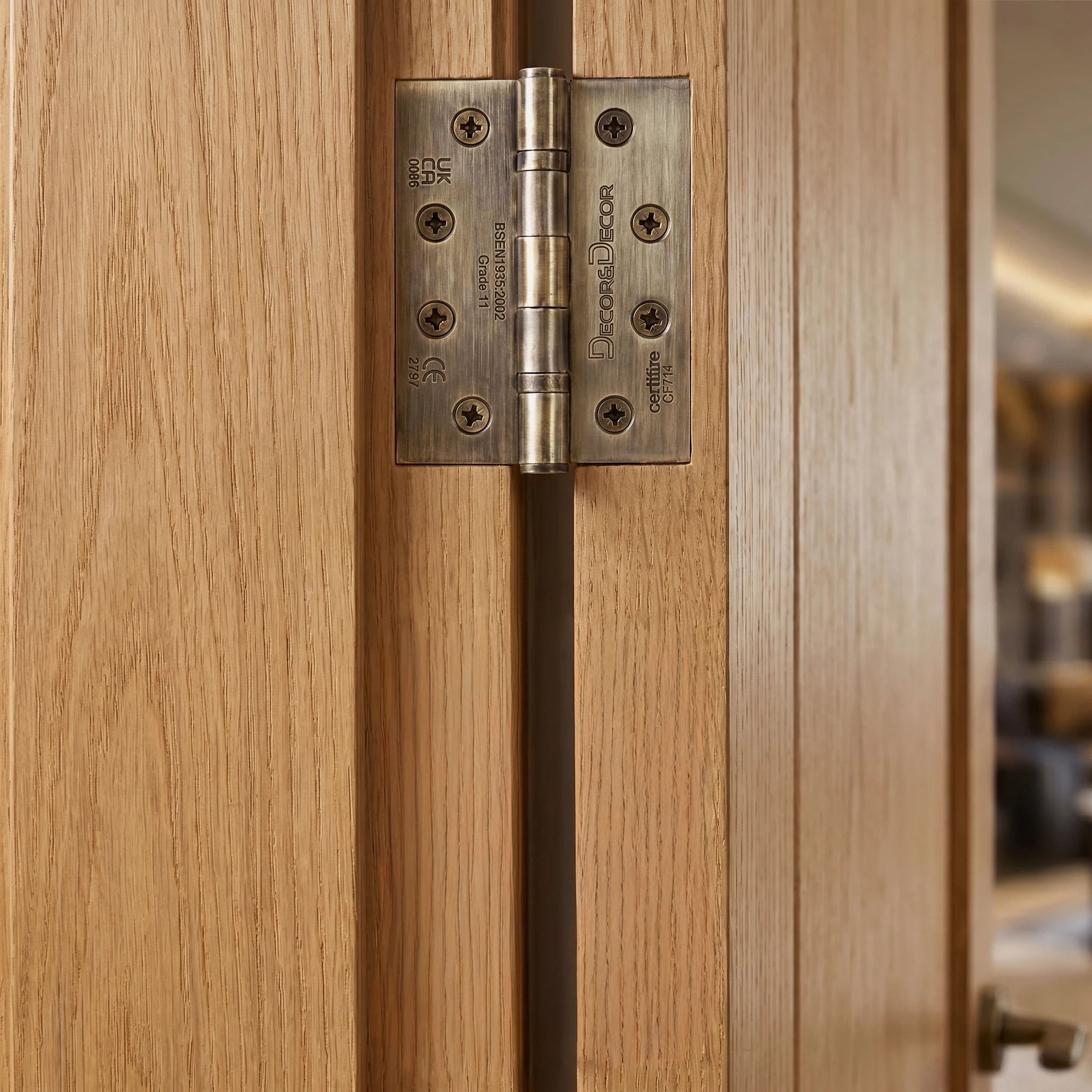 Ball Bearing Fire Rated Door Hinges - 102mm - Pair - Antique Brass – in a styled room setting