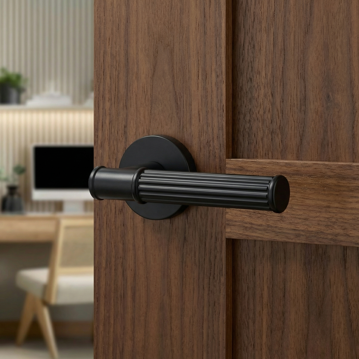 Leto Matt Black Door Lever Handles – fitted on an interior door in a styled room setting