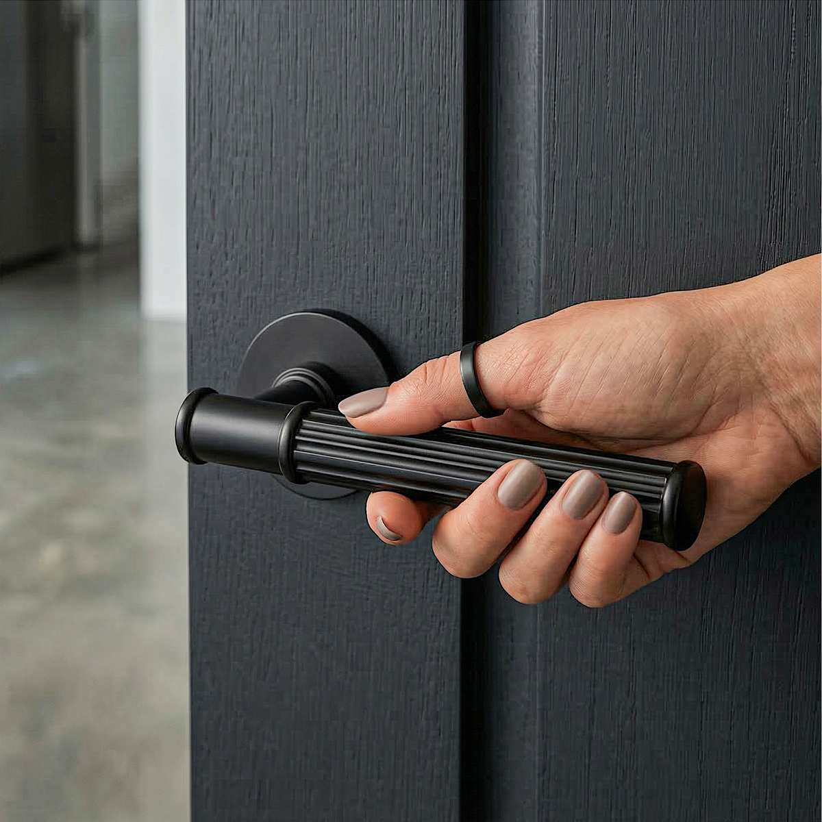 Leto Matt Black Passage Door Lever Handles – fitted on an interior door in a styled room setting 5