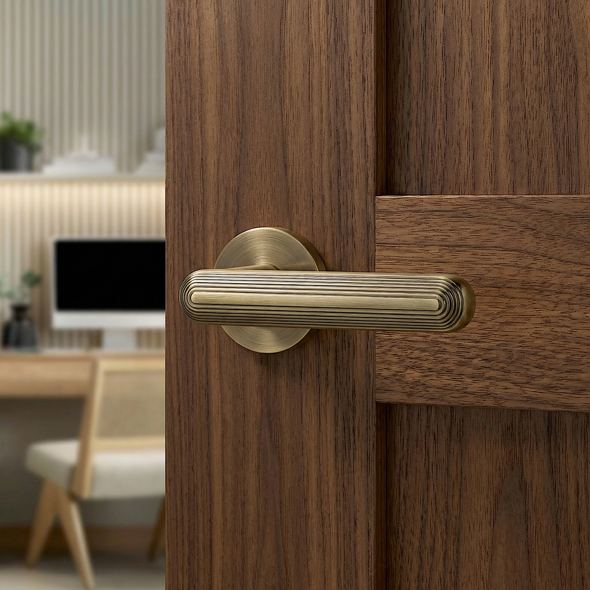 Marin Antique Brass Door Lever Handles – fitted on an interior door in a styled room setting
