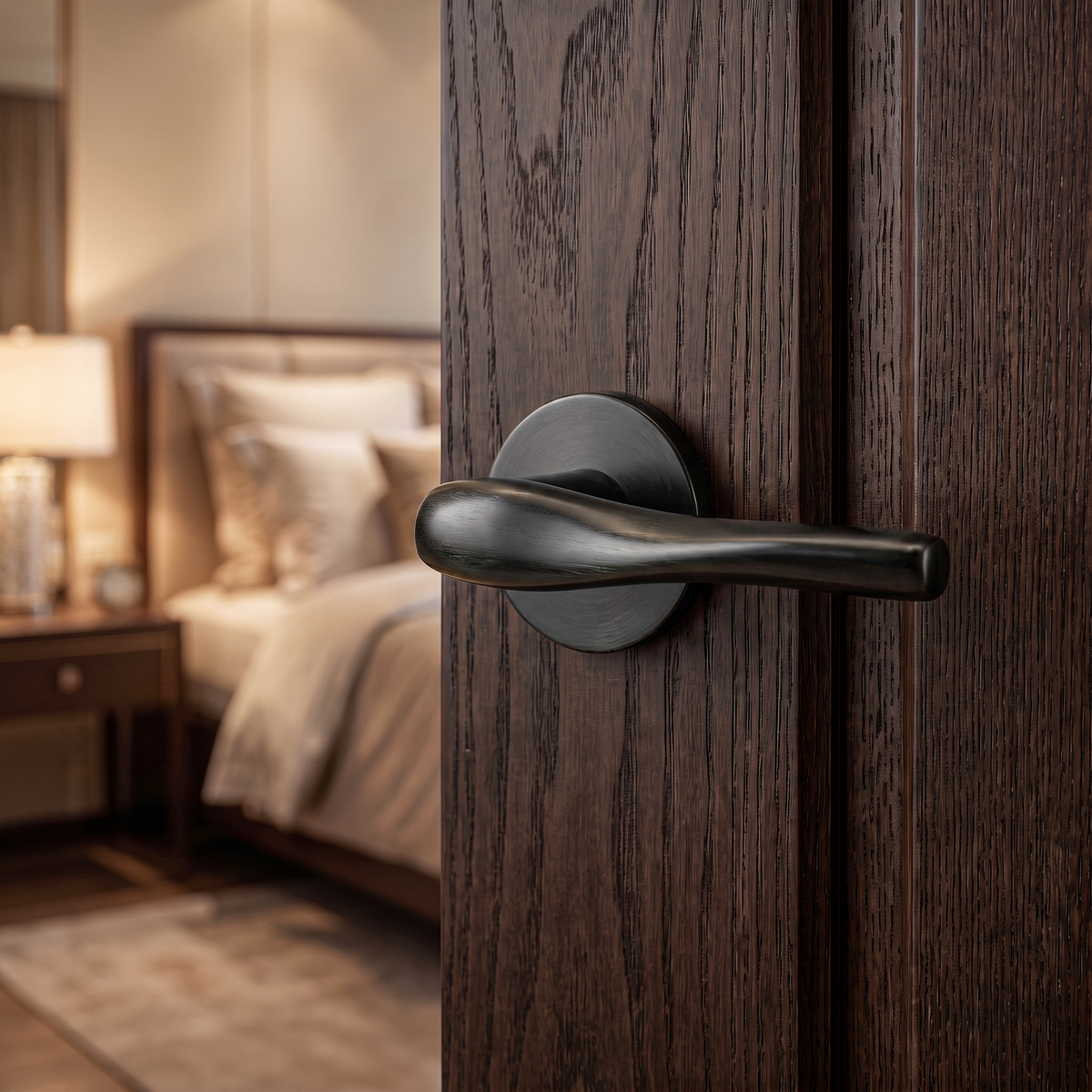 Nanda Matt Black Bathroom Door Lever Handles – fitted on an interior door in a styled room setting 2