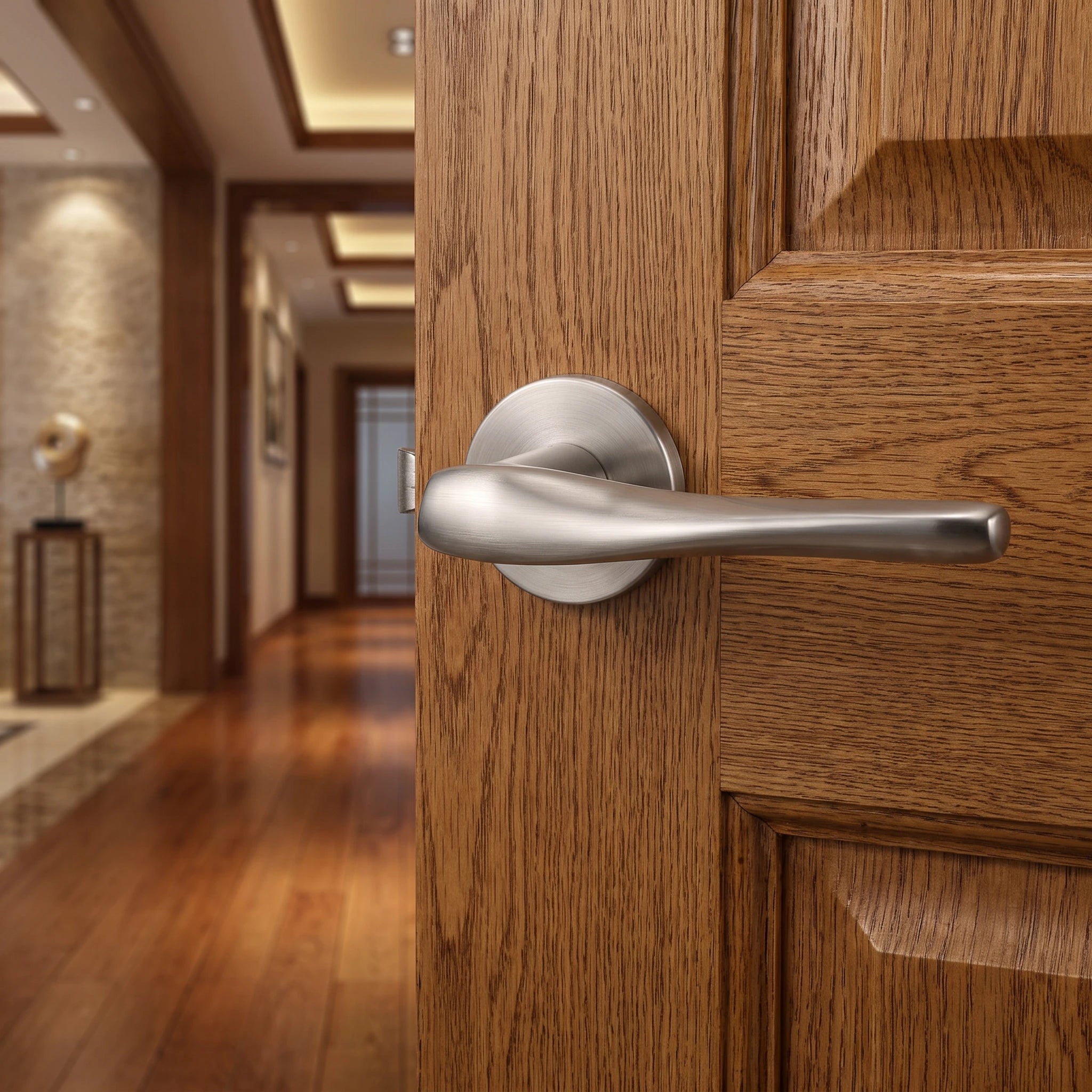 Nanda Satin Nickel Bathroom Door Handles – fitted on an interior door in a styled room setting 4