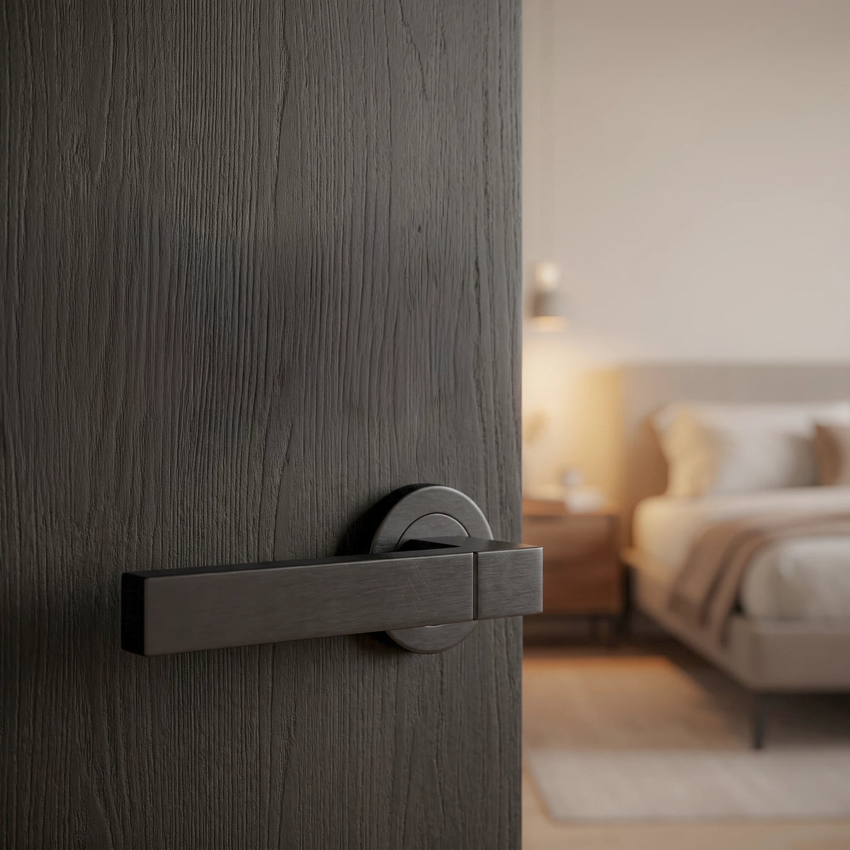 Lumina Matt Black Privacy Door Lever Handles – fitted on an interior door in a styled room setting 3