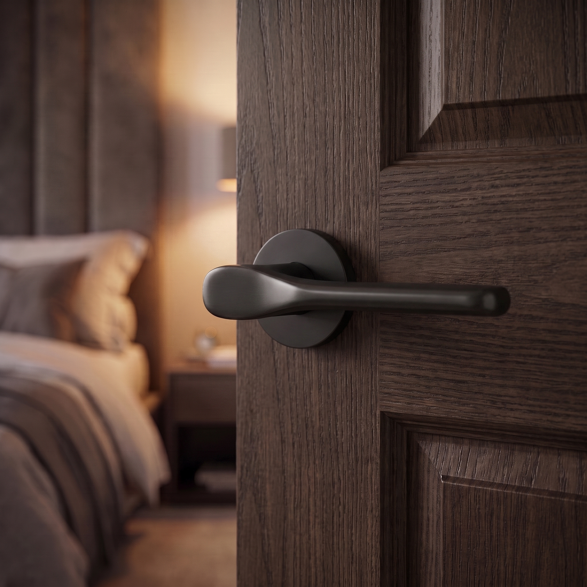 Verita Matt Black Passage Door Lever Handles – fitted on an interior door in a styled room setting 4