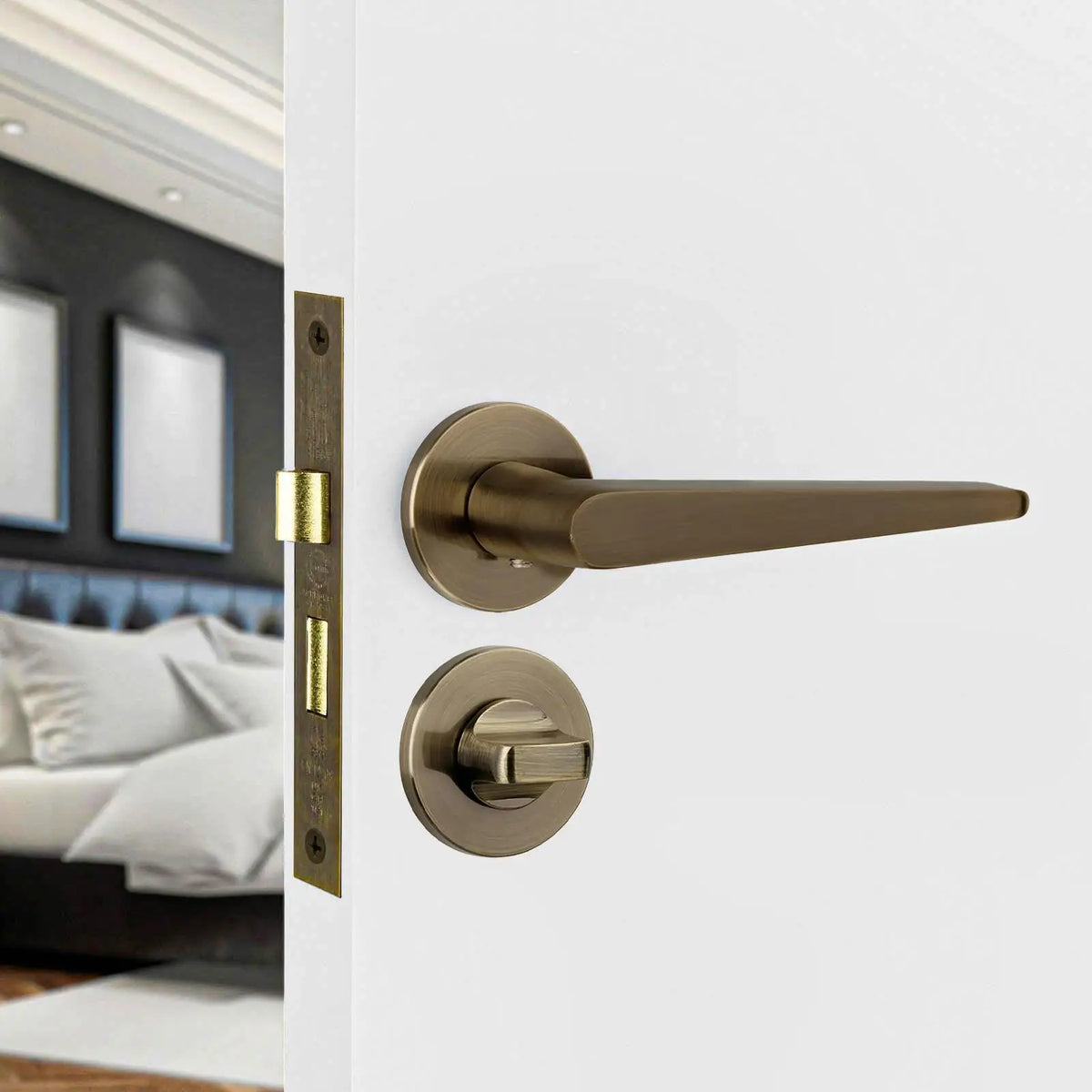 Bronze-colored door handle with thumb-turn lock from Terra Antique Brass Bathroom Kit