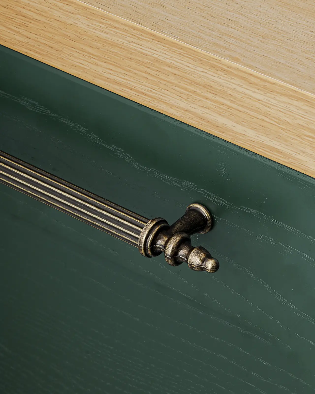 Ornate metal drawer pull on Vandon Traditional T-Bar Kitchen Drawer Handle in Antique Brass